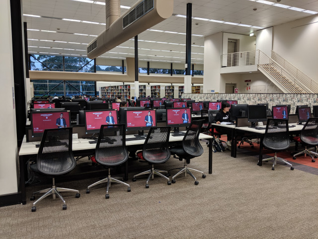 2. In front of you is a cluster of computers which wraps around the corner.