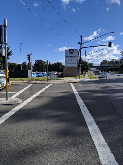 3. Continue when permitted by the traffic signals.