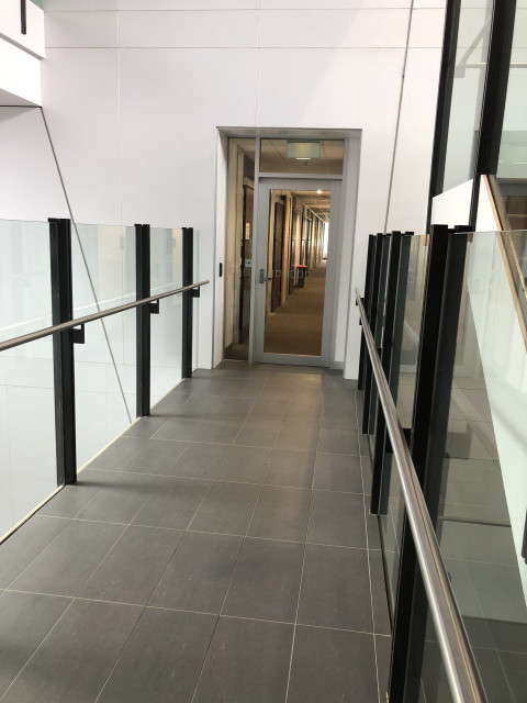 Across walkway near stairs