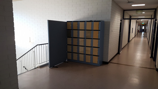 Assignment boxes at the top of the north staircase.