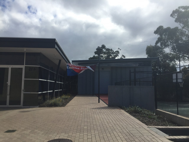 Back of the building next to the champions court
