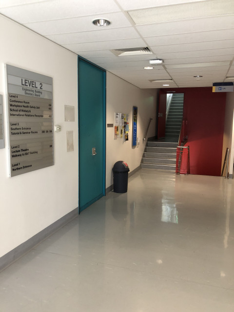 Blue door on left, view from IST walkway