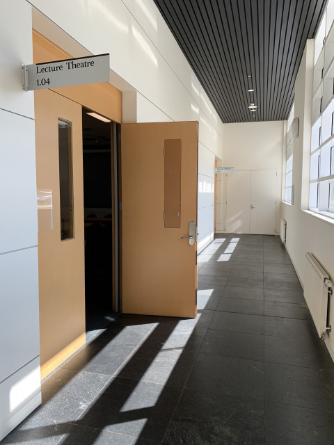 Corridor showing two entry doors