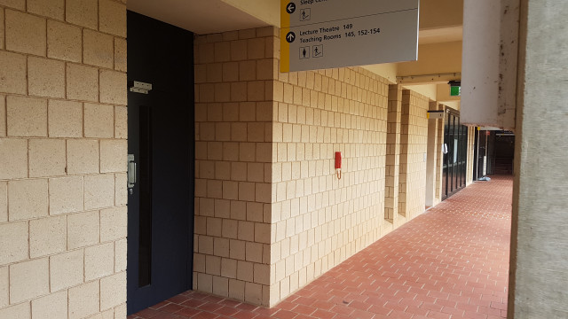 Courtyard door leading to sleep lab.