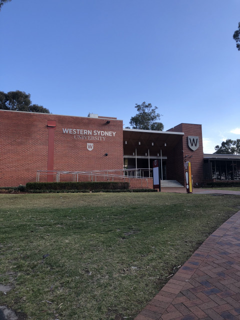 D on left, building C on right