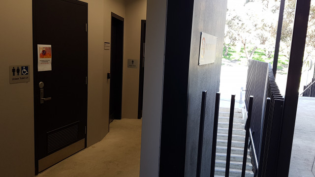 Disabled toilets by the road entrance of the building.