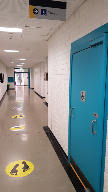 Disabled toilet facing the main level 1 entrance.