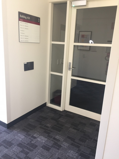 Door requiring key card access to enter