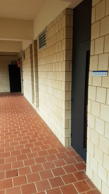 Door to rooms 104, 105, 107 and 108