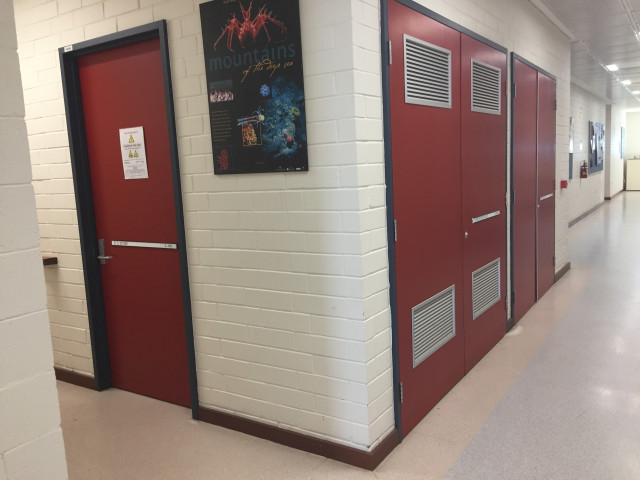Down the corridor on the left