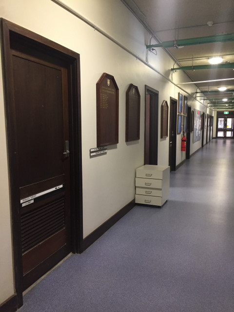 Down the east corridor on the left
