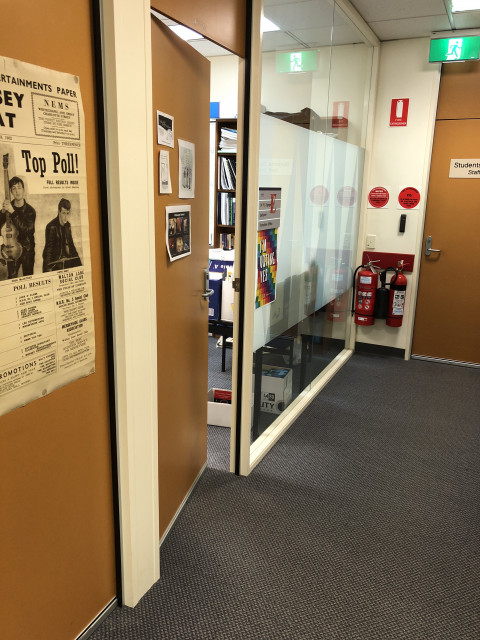 End of hall on left side