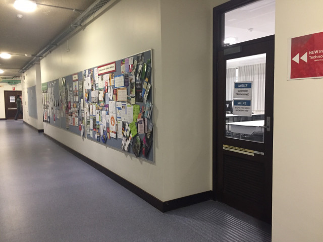 Entrance 1, located at the western end of the corridor