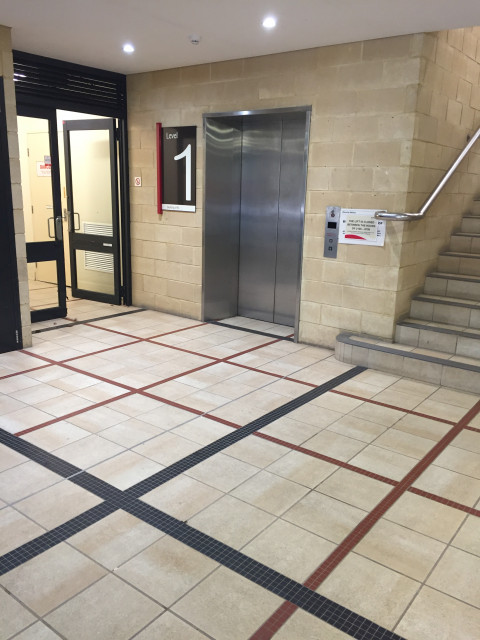 Entrance to left of lift