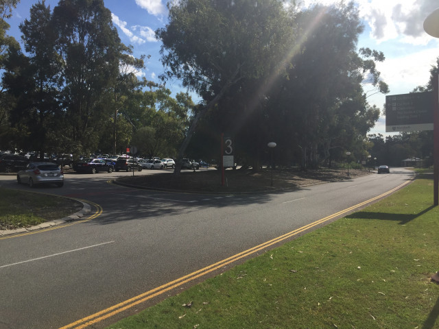 Exit campus drive north into carpark 3