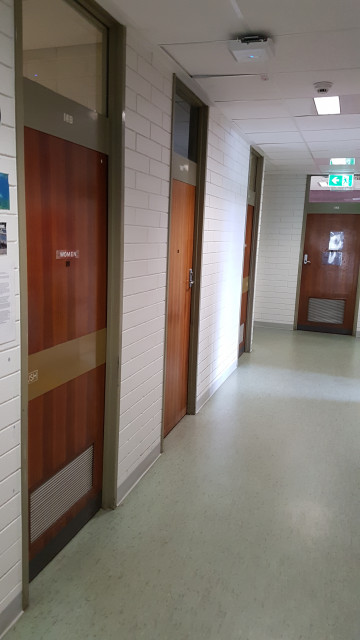 Female toilet in the northwest corner of the building.
