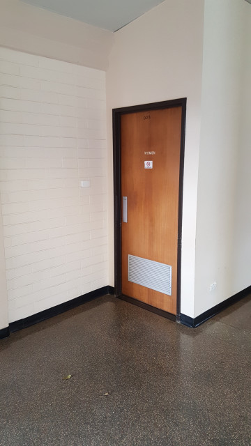 Female's level 0 toilet just inside entrance from humanities