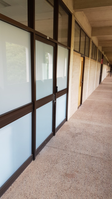 Frosted glass entrance to the 202 postgraduate office