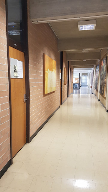 Hallway containing room 013 (near) to 015 (far) from Flinders university art gallery