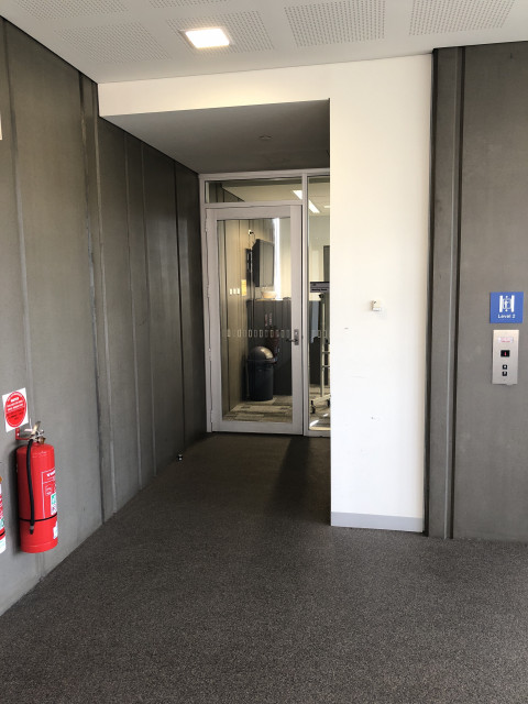 Hidden behind lift on lvl 2
