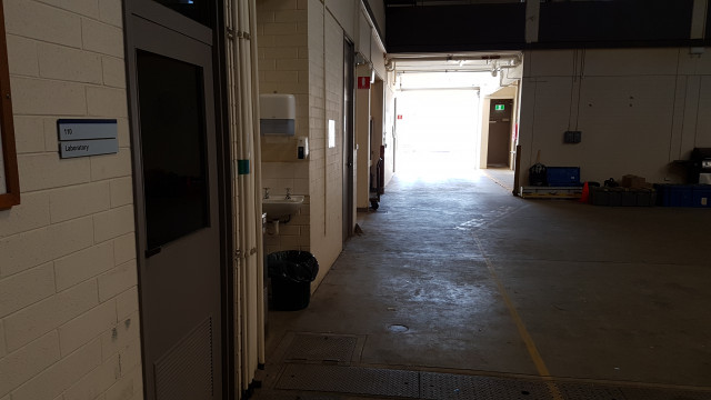 Lab 110 near the loading bay entry.