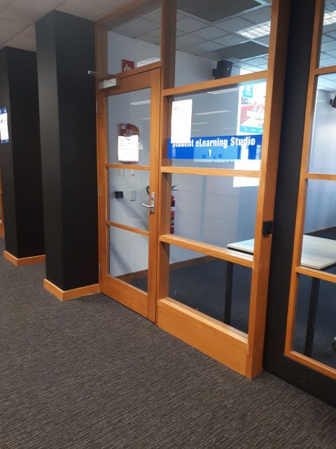 Large glassed door room
