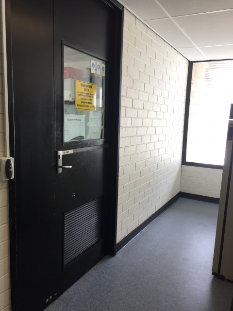 Last door at the end of the hallway