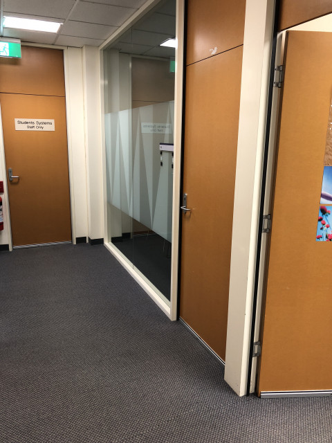 Last door on right before students systems