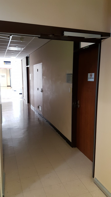 Lecture theatre 102 right entrance by staircase