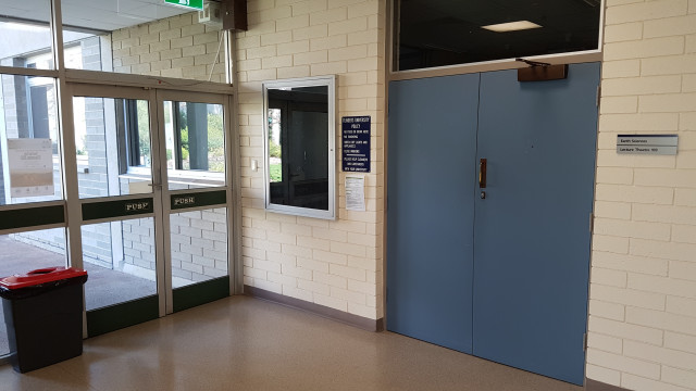 Lecture theatre 103 inside the lakeside entrance. Door 1