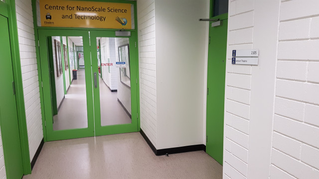 Lecture theatre 2105 just outside the west entrance of the Centre for NanoScale Science and Technology.