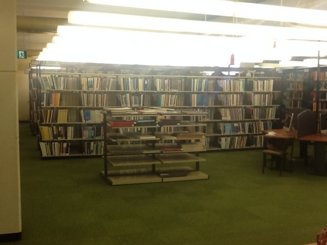 Located behind the mac computer hub