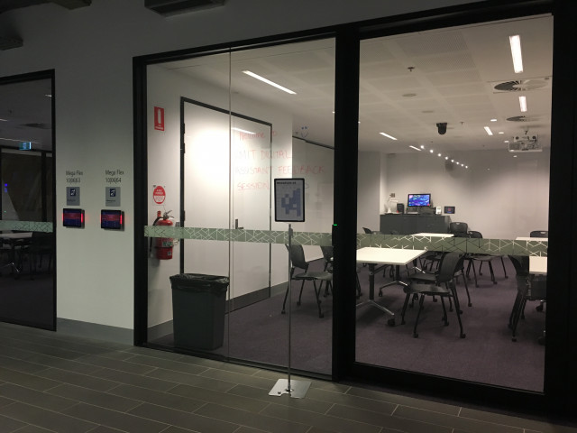 Located beside the other Megaflex room on the corner beside the libraries main enterance.