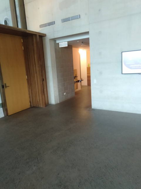 Located down corridor