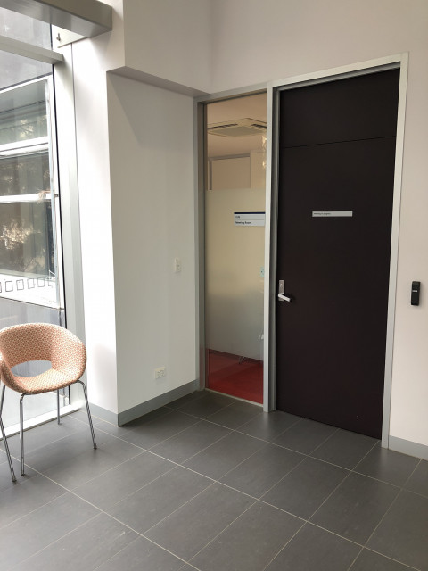 Located next to lifts