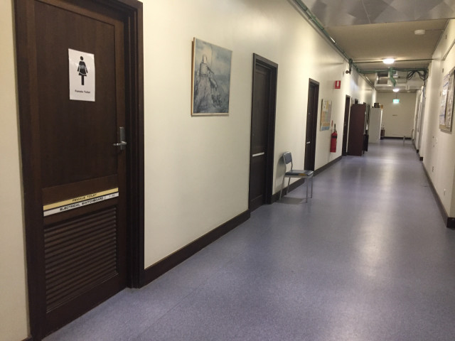 Located opposite the stairs