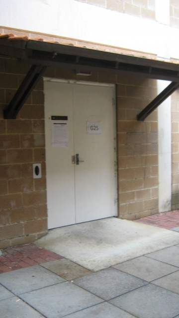 Located through the door.