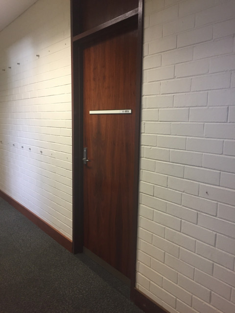 Located to the left of the kitchen