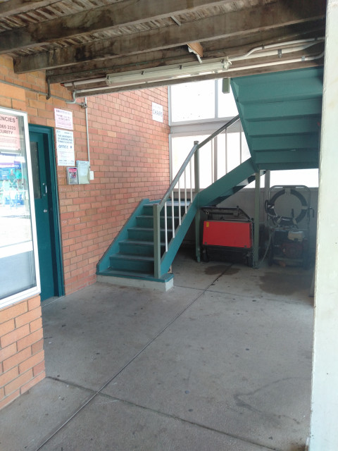 Located upstairs
