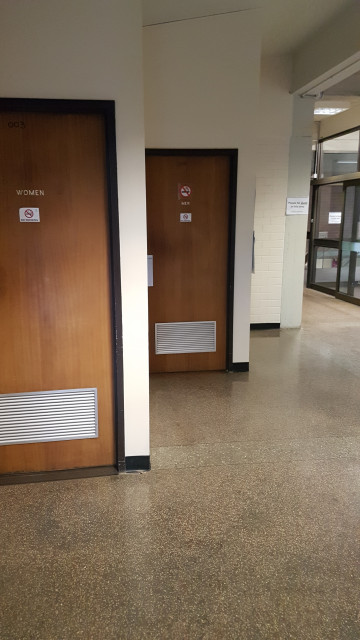 Male and female toilets from entrance