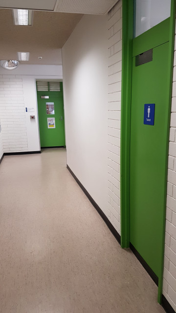 Male toilet facing the southwest corner.