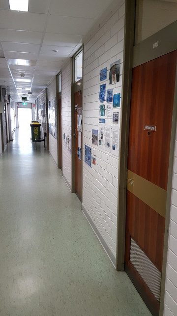 Male toilet from the northwest corner of the building.