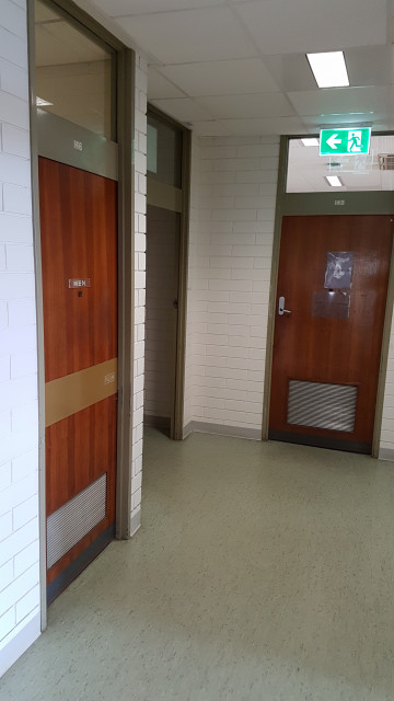 Male toilet in the northwest corner of the building.