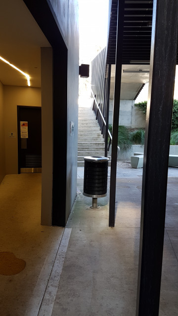 Male toilets by the road entrance of the building.