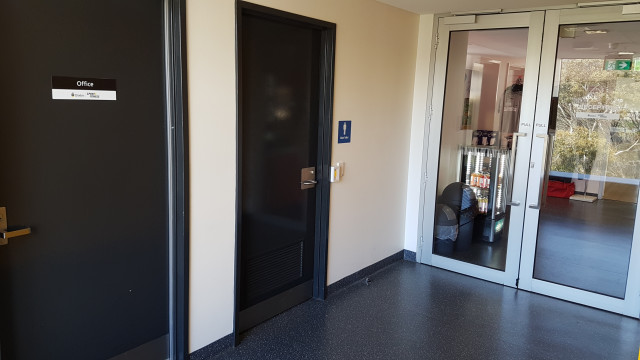 Male toilets from main entrance hallway.