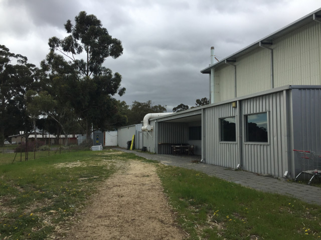 North side, next to the animal paddocks