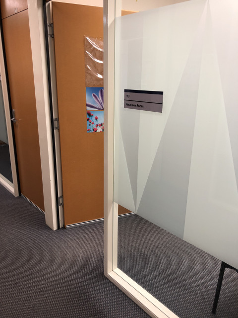 On right hand side second to last door