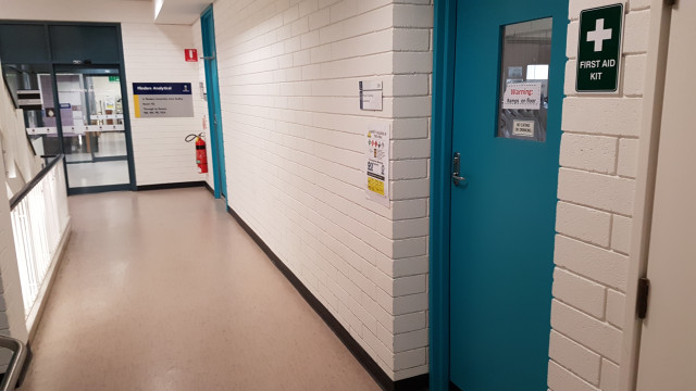 Physics lab 106 beside staircase.