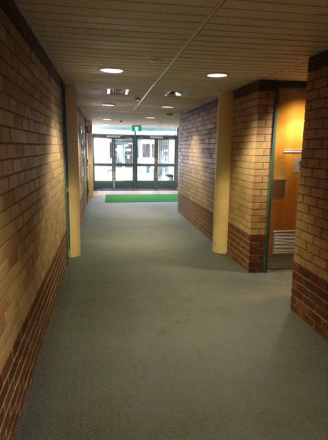 Room 117 in the first corridor to the right