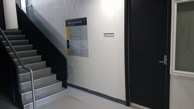 Room 140 by the west staircase.